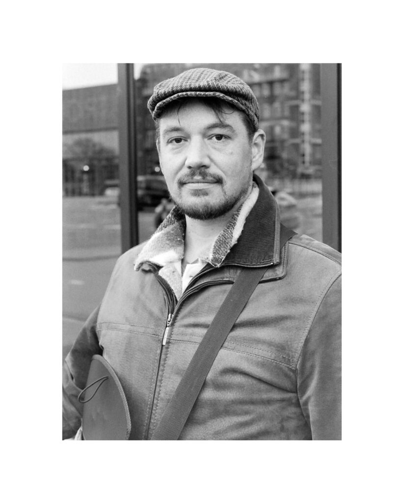 Black and white photograph of Bart looking at the camera.